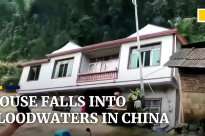 Family watch in terror as their house collapses into floodwaters amid record rains in southern China