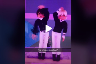 two baby dolls dancing in school
