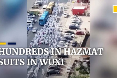 Hundreds in hazmat suits moved to quarantine facilities under China’s strict zero-Covid policy