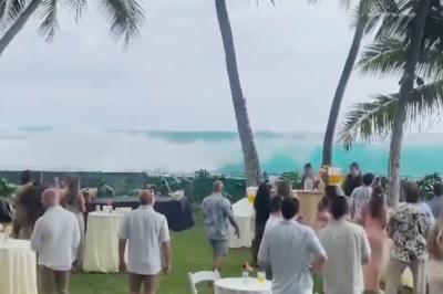 Incredible Huge Hawaii waves crash some more than 20 feet high into homes — and weddings — in 'historic' swell