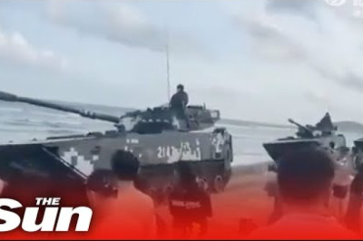 China vows to ‘fight to death’ and masses tanks on beaches for Taiwan strike