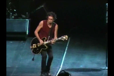 Keith Richards starts playing It's Only Rock 'n Roll, while Mick Jagger starts singing Satisfaction