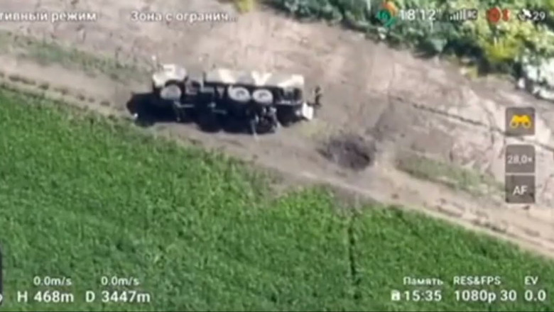 Russian Truck Has a Bad Day -- Falls Over and Then Targeted