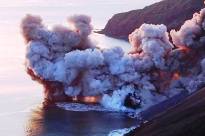 Lava flows and boiling sea: Incredible footage of erupting volcano in Italy