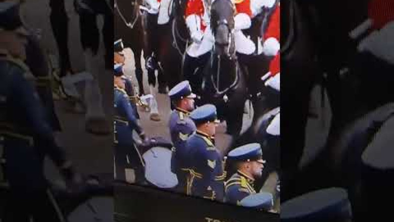Queen funeral. guardsman gets hit in face by horse. Windsor castle.