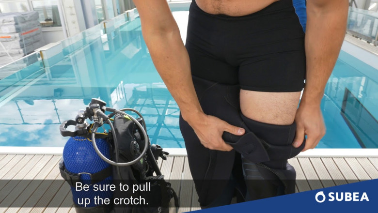 How to get your scuba diving suit on ?