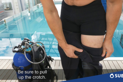 How to get your scuba diving suit on ?