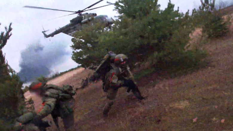 Russia shows footage of airport capture in Ukraine and Ka-52 being hit by MANPADS