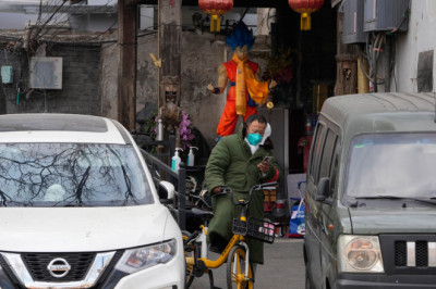 COVID-19 is about to explode in China. What that could mean for the United States.