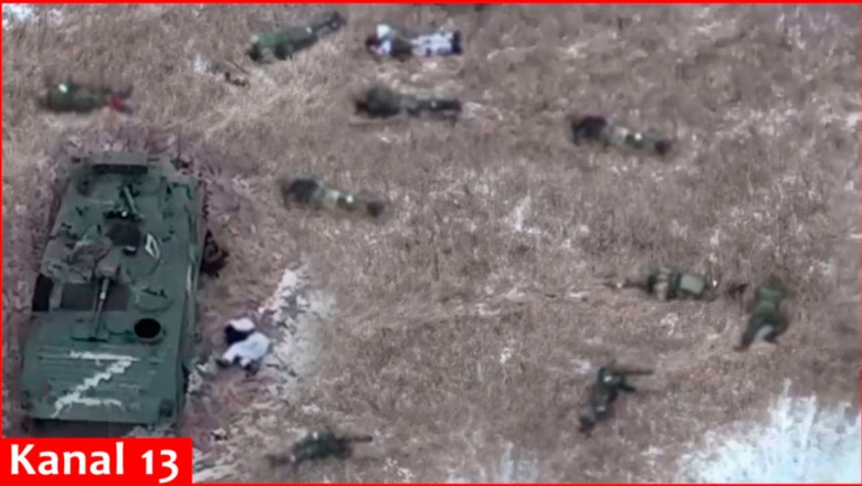Russians scattered around destroyed equipment - some of the wounded are moving