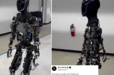 Elon Musk takes Tesla's creepy Optimus robot for a walk
